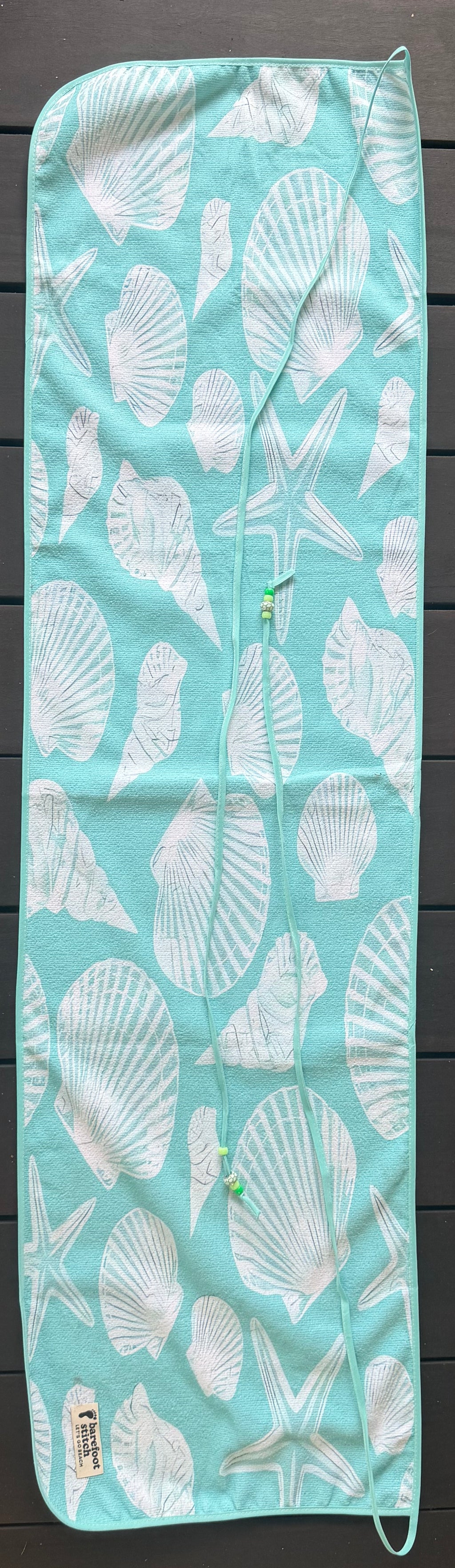 Sally sells seashells (towel 53inch by 15inch) (strings 310inch)